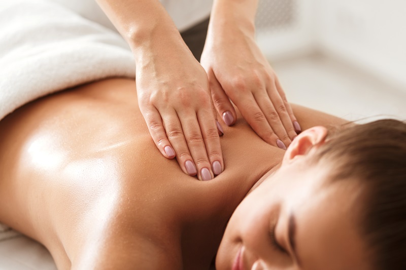 woman getting a deep tissue massage